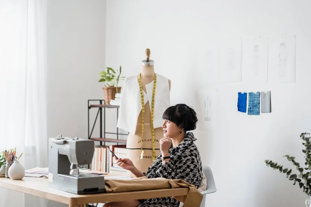 having inefficient or ineffective practices-michael-burrows-7147965 lady sitting on a chair while using phone while being in a room of fashion