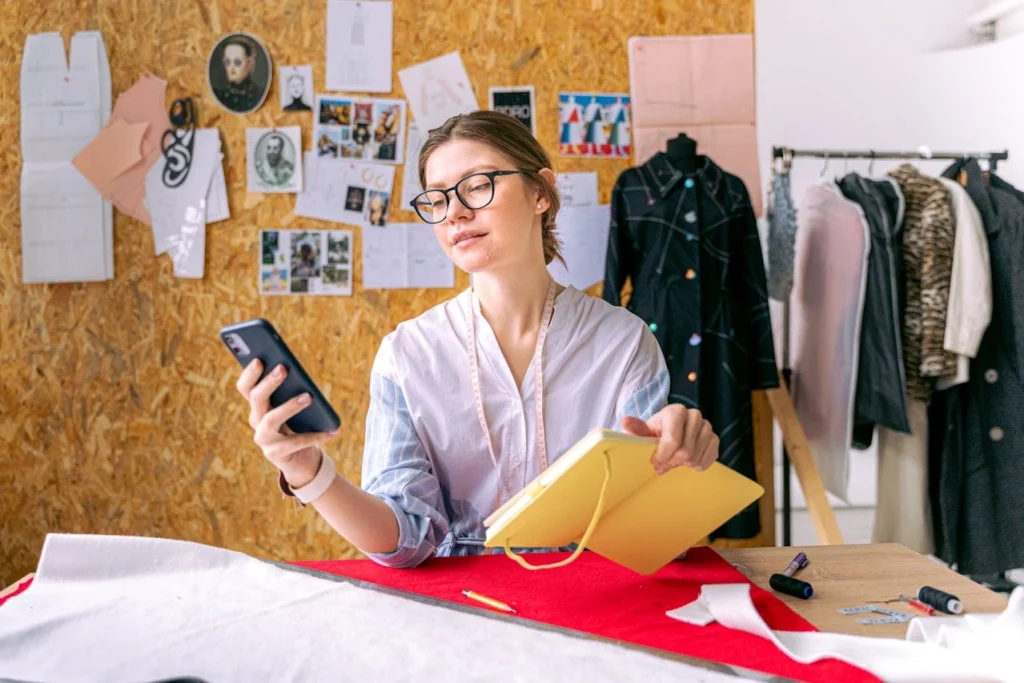 pexels-shkrabaanthony-6665058 fashion assortment planning where woman in eyeglasses holding a dairy