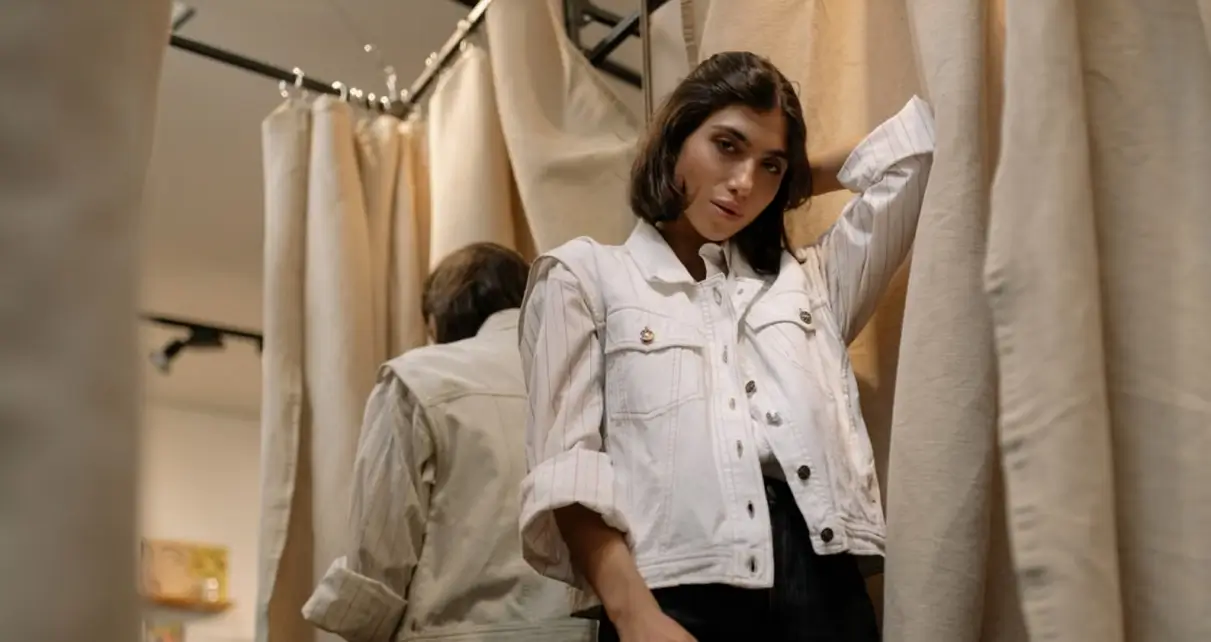 Yushkova Designs Customers trying on clothes in a fitting room